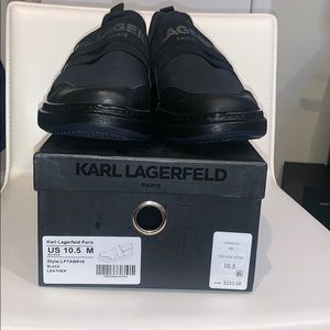 Versatile black slip on shoes with rubber bottom.